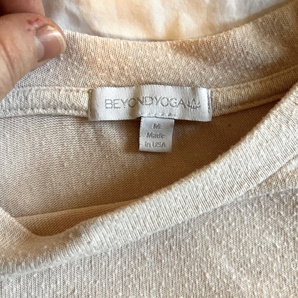 Light pink BEYOND YOGA coverup light sweater.